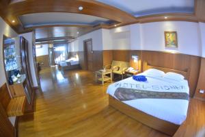 Katil atau katil-katil dalam bilik di Hotel Sidney