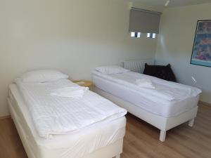 Postel nebo postele na pokoji v ubytování Fermata North