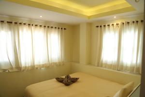 Letto o letti in una camera di Bed and Breakfast Thamel