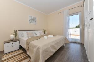 Postel nebo postele na pokoji v ubytování Villa Rafajela - Private Pool