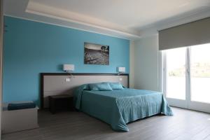 Voodi või voodid majutusasutuse Sud Est Guest House toas