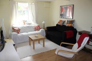 En eller flere senge i et værelse på Schräges Haus