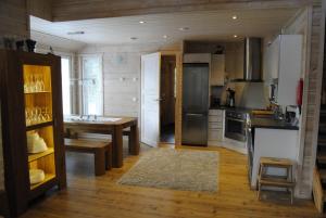 Kuchyň nebo kuchyňský kout v ubytování RukaNeliö Cottage