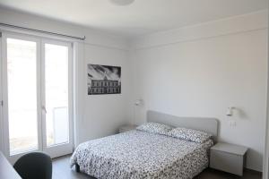 Voodi või voodid majutusasutuse Sud Est Guest House toas