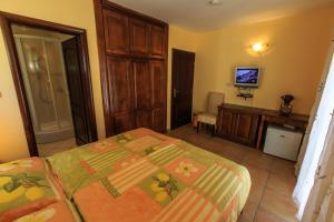 TV a/nebo společenská místnost v ubytování daMonte – Apartments and rooms