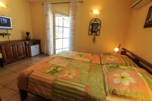 Postel nebo postele na pokoji v ubytování daMonte – Apartments and rooms