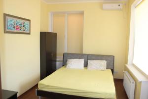 A bed or beds in a room at Holiday Home Poseydon Rest