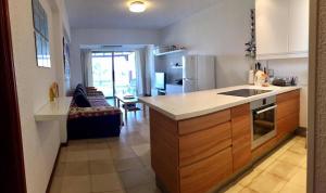 a kitchen with a sink and a counter top at Sandy Beach Villas 17 in Pyla