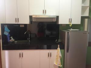 Kuchyň nebo kuchyňský kout v ubytování SD4 Studio Apartment