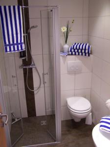 Ванна кімната в Ferienwohnung Sommerwind