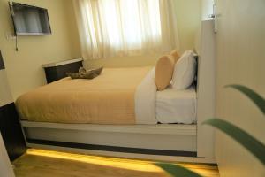 Letto o letti in una camera di Bed and Breakfast Thamel
