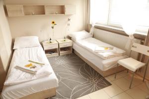 Posteľ alebo postele v izbe v ubytovaní Standard Delegacyjny Bed & Breakfast