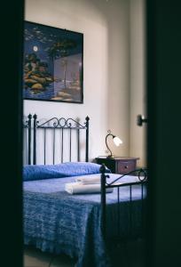 Postel nebo postele na pokoji v ubytování Hotel Risorgimento