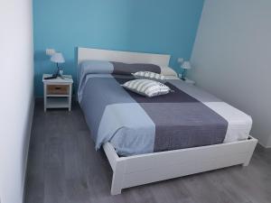 Postel nebo postele na pokoji v ubytování Villa Caruso
