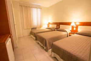 Postel nebo postele na pokoji v ubytování Hotel Ipanema de Sorocaba + 22 fotografií