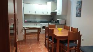 Virtuvė arba virtuvėlė apgyvendinimo įstaigoje Apartamento Pueblo de Pescadores