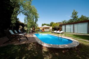 Swimmingpoolen hos eller tæt på Hotel Rural Las Calas