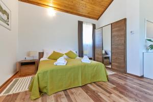 En eller flere senge i et værelse på B&B Apartments Burić Plitvice Lakes