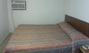 Ένα ή περισσότερα κρεβάτια σε δωμάτιο στο Relax Inn Ranger