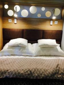 Posteľ alebo postele v izbe v ubytovaní Piper Cytadela Apartament