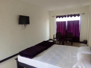 Postel nebo postele na pokoji v ubytování Dream Nest Resorts