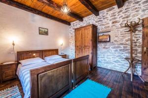 Posteľ alebo postele v izbe v ubytovaní villa sisman