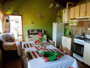 A cozinha ou cozinha compacta de Cabañas Normana Inn