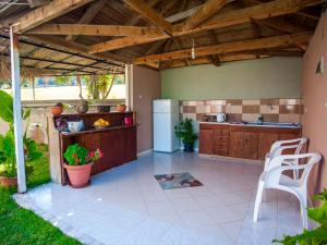 Kuchyň nebo kuchyňský kout v ubytování Eleni's Studios + 33 fotografií