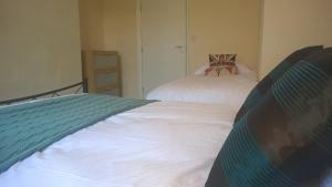 Een bed of bedden in een kamer bij Westmount 1st South