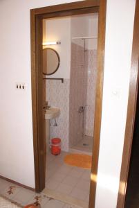 a bathroom with a shower and a sink at Villa Punta in Okrug Donji +30 photos