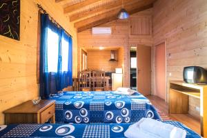 Ένα ή περισσότερα κρεβάτια σε δωμάτιο στο Quintinha do Casal Ruivo +37 φωτογραφίες