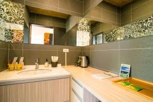 Koupelna v ubytování 宜人生活溜滑梯親子民宿 Easylife B&B + 37 fotografií