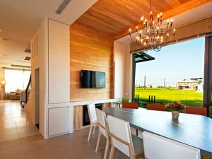TV a/nebo společenská místnost v ubytování 宜人生活溜滑梯親子民宿 Easylife B&B
