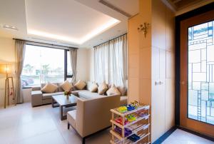 Posezení v ubytování 宜人生活溜滑梯親子民宿 Easylife B&B