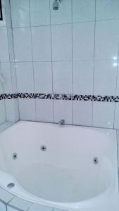 Een badkamer bij Hospedaje Julito