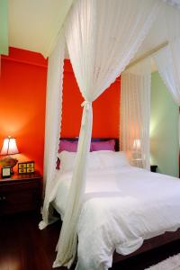 Ένα ή περισσότερα κρεβάτια σε δωμάτιο στο Moon House B&B