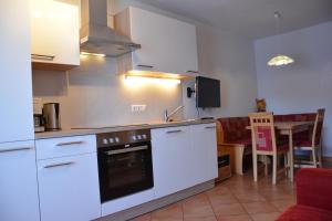 Kuchyňa alebo kuchynka v ubytovaní Appartement Haus Gatterer
