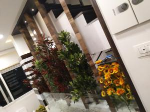 an overhead view of a room with flowers on the floor at Hotel Park Residency in Vijayawāda