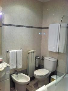 Un baño de Apartahotel Siglo XXI