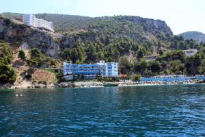 a view of a resort from the water at Hotel Nimfa in Vlorë