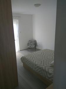 Postel nebo postele na pokoji v ubytování Apartment Belas