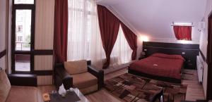 Postel nebo postele na pokoji v ubytování Viva Hotel