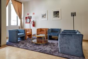 Posezení v ubytování Porto Domus Hotel