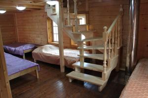 Двухъярусная кровать или двухъярусные кровати в номере  Поместье Старый замок