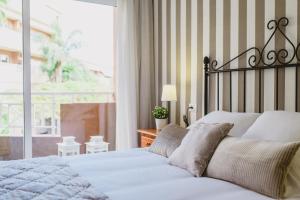 Una cama o camas en una habitación de Vista Paraíso - La Asomada