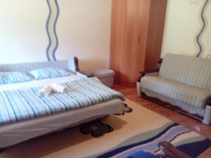 Letto o letti in una camera di Guesthouse Andrea A