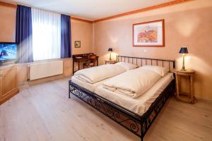 Postel nebo postele na pokoji v ubytování Hotel La Scala
