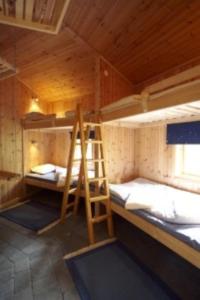Postel nebo postele na pokoji v ubytování STF Växhuset Hostel