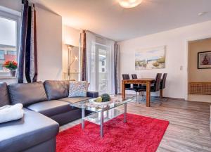 A seating area at Apartment Meereswoge