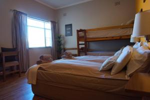 Postel nebo postele na pokoji v ubytování Omaruru Guesthouse